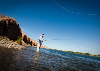 man casting a fly rod